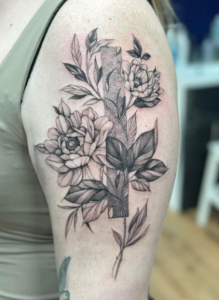 Fineline bloemen tattoo